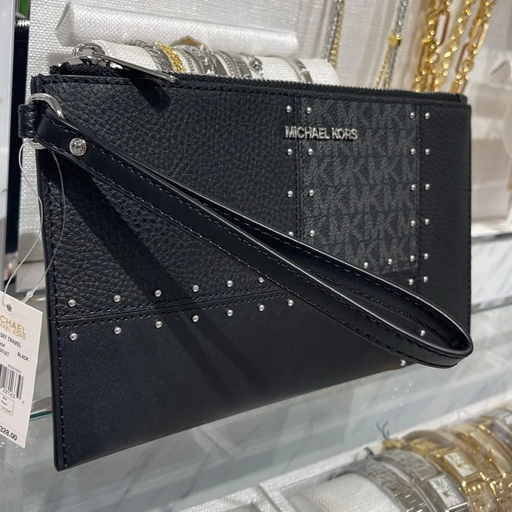 Michael Kors Jet Set Travel Lg Studded Patchwork and Sign Logo Wristlet
Black - Picture 2 of 16